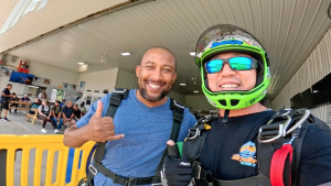 Wylie and instructor gearing up to skydive