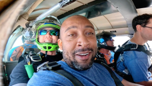 Wylie and instructor on plane preparing to skydive