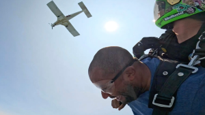 Wylie and instructor skydiving
