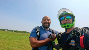 Wylie and instructor after skydiving
